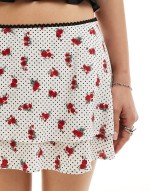 ditsy rose print tiered mini skirt in white