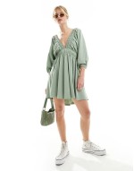 plunge elastic tea mini dress with ruched waist in light green