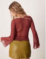 mesh angel sve top with lettuce hem detail in fig